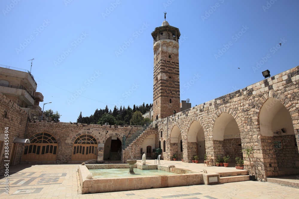El Nuri Mosque is located on the banks of the Asi River. It is also known as Nureddin Zengi Mosque. The mosque was built in 1172. Hama, Syria.