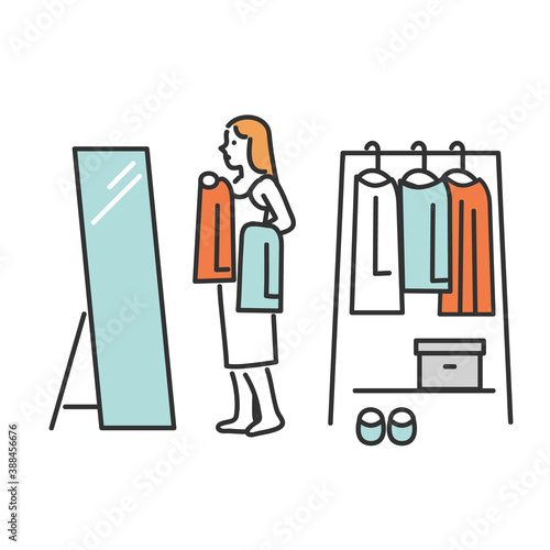 鏡を見ながら服を選んでいる女性のイラスト素材