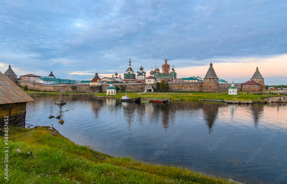 Evening view of the Solovetsky Monastery from the side of the herring cape.