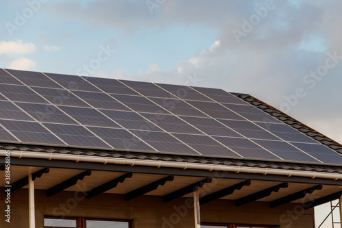 Solar panels on a roof of residential house. Photovoltaic modules for innovation alternative energy