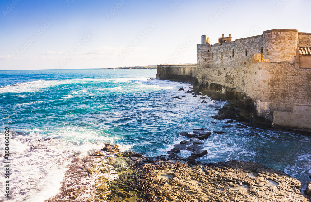 View to fortification walls of Castello Maniace in Syracuse, Sicily, Italy