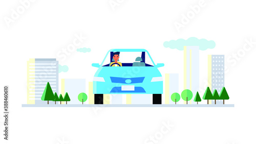 a man drives luxury Hybrid car out of a town during vacation