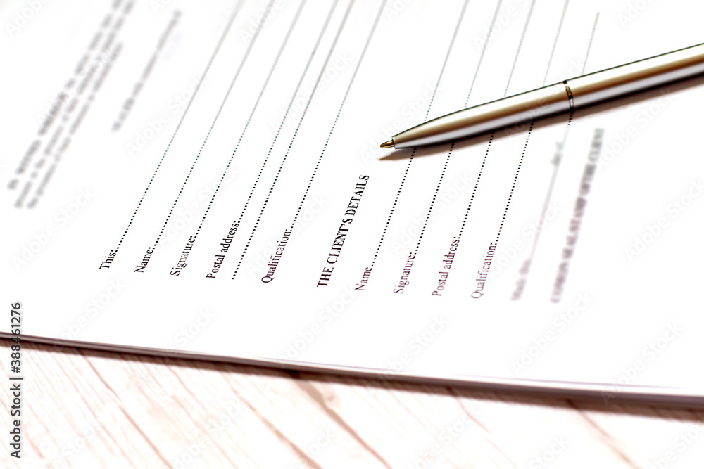 Sign the name on a paper with a pen Sign the name on a paper with a pen