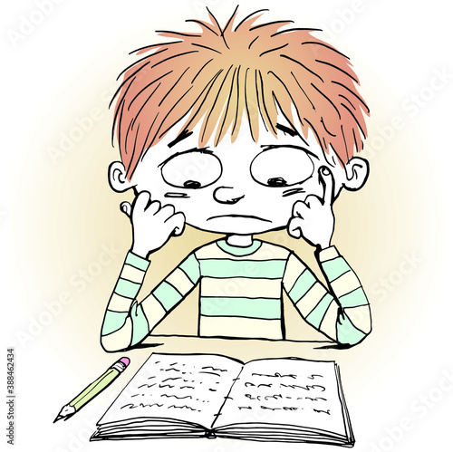 boy is sad looking at the notebook and studying