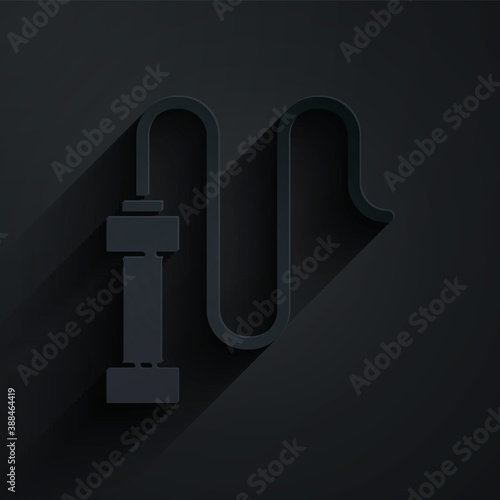 Paper cut Braided leather whip icon isolated on black background. Paper art style. Vector.