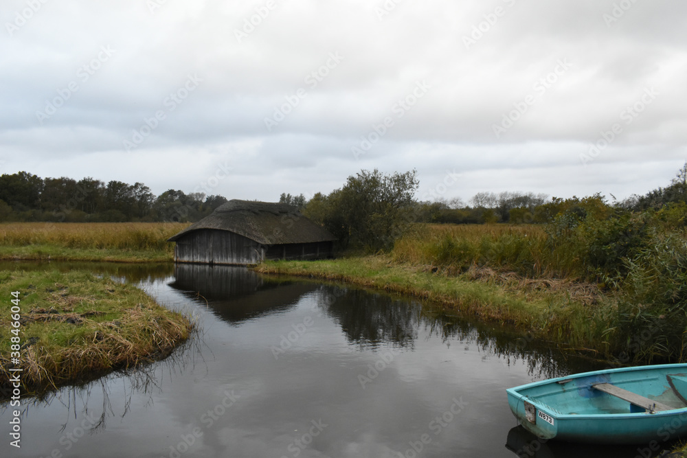 Boat houses on Hickling Broad in Norfolk