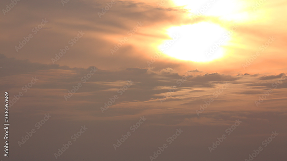 Sun with Cloudy Continent under Sunset