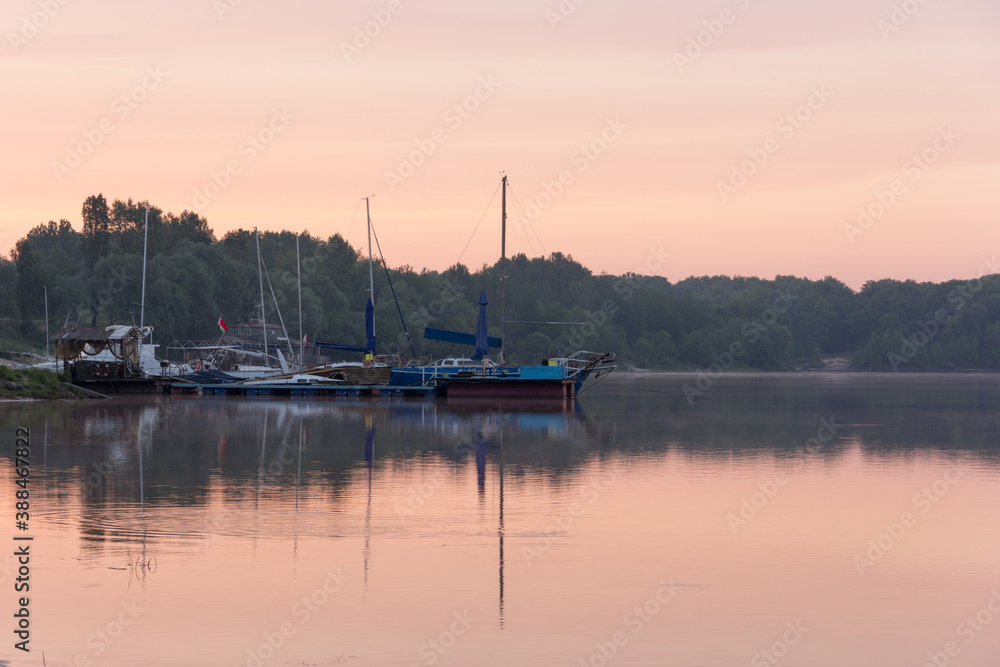 anchorage of yachts on the lake at dawn