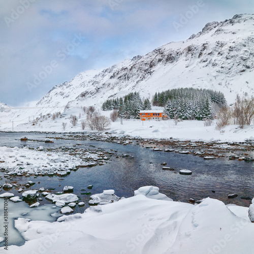 Marwelous winter scene of Kartfjorden on Vestvagoy island with snowy  mountain peaks on Lofoten Islands photo