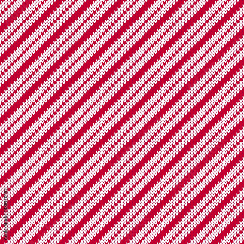 Red and white knitted diagonal stripes sweater seamless pattern.