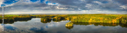 Golden autumn of Poland by the Straszyn lake from above.