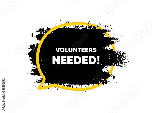 Volunteers needed. Paint brush stroke in speech bubble frame. Volunteering service sign. Charity work symbol. Paint brush ink splash banner. Volunteers needed badge shape. Vector