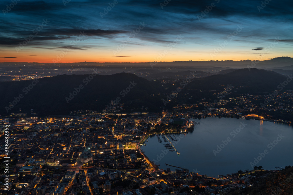 Panorama of Como city and Lake Como seen from Brunate after the sunset.