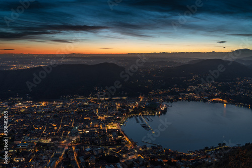 Panorama of Como city and Lake Como seen from Brunate after the sunset.