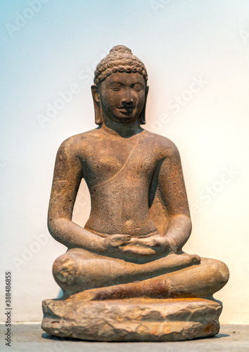 Sandstone Buddha statues of the culture of the Mekong Delta in the 6th century. This is art of meticulous stone sculpture to honor beauty of Buddhist culture and spirituality at that time in Vietnam photo