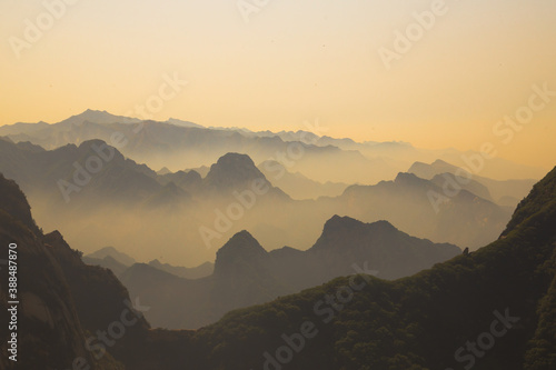 Foggy Huashan mountains at sunset © Volodymyr