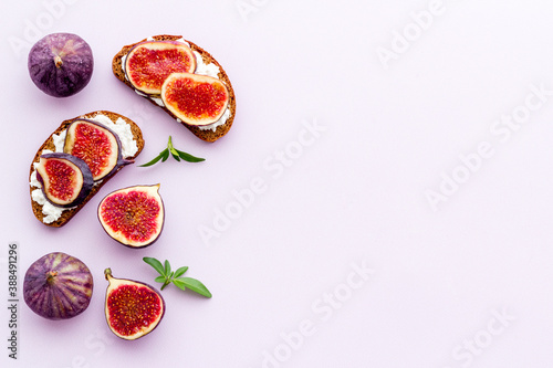 Canape or sandwich with figs and cheese, overhead view