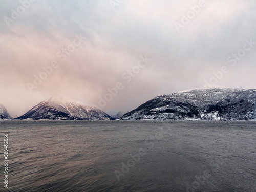 Winter landscape fjord sunrise sunset, Norway. Ferry Vangsnes to Balestrand. photo