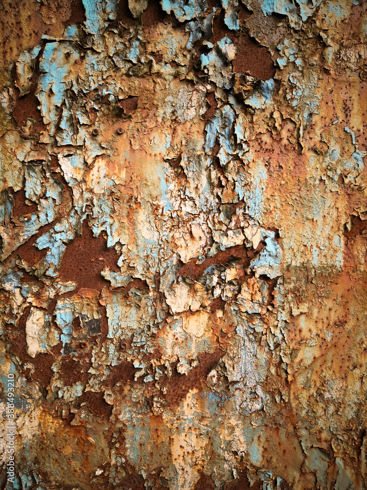 Rusty metal surface with peeling blue paint Rusty metal surface with peeling blue paint