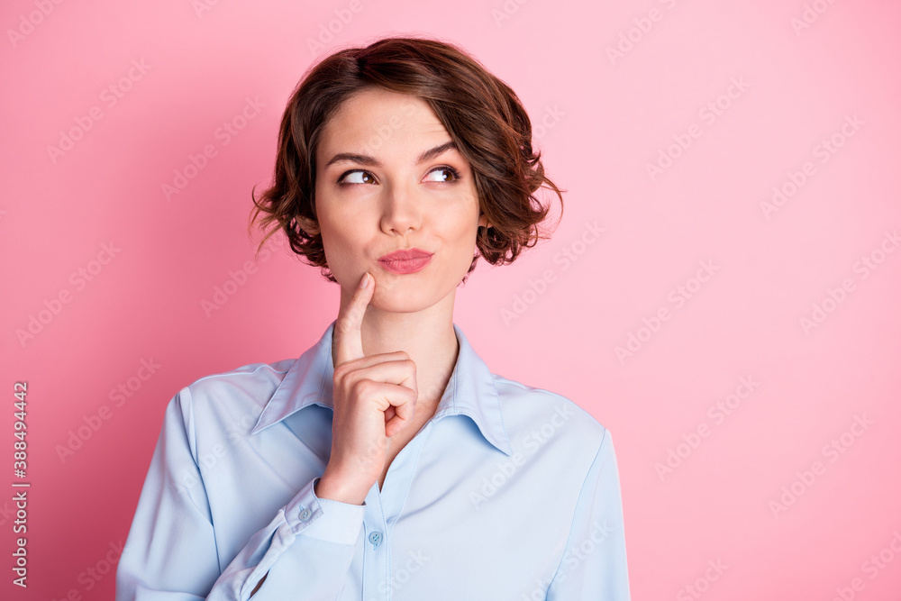 Closeup photo of attractive charming lady arm finger on chin look tricky side up empty space cunning smart intelligent person wear blue office shirt isolated pink pastel color background Closeup photo of attractive charming lady arm finger on chin look tricky side up empty space cunning smart intelligent person wear blue office shirt isolated pink pastel color background