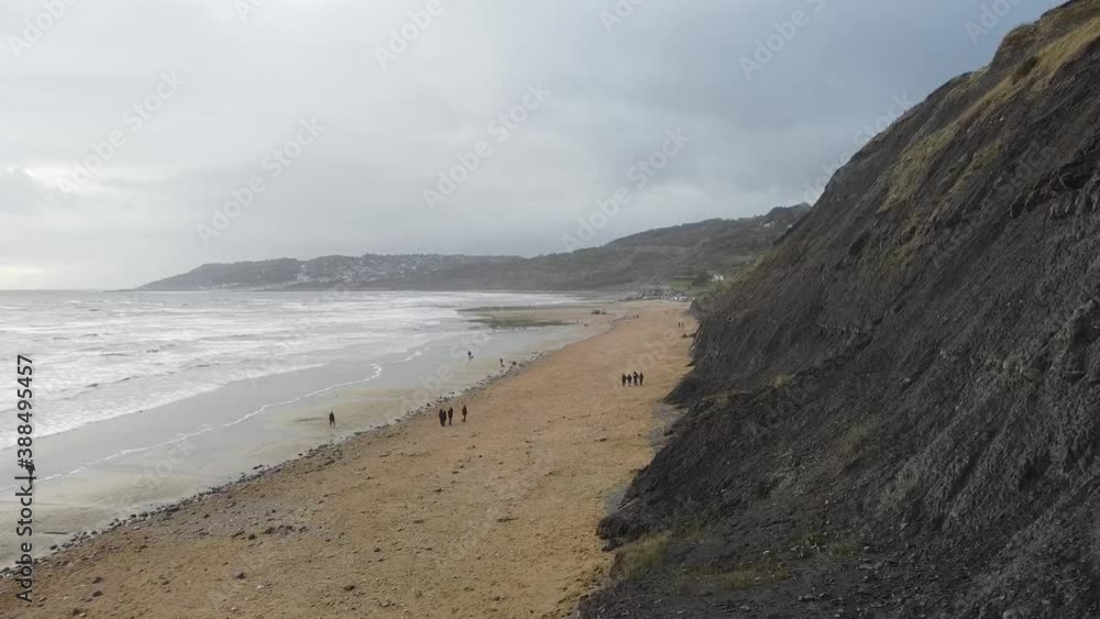 Shot of dark cliff by jurassic coast in engand