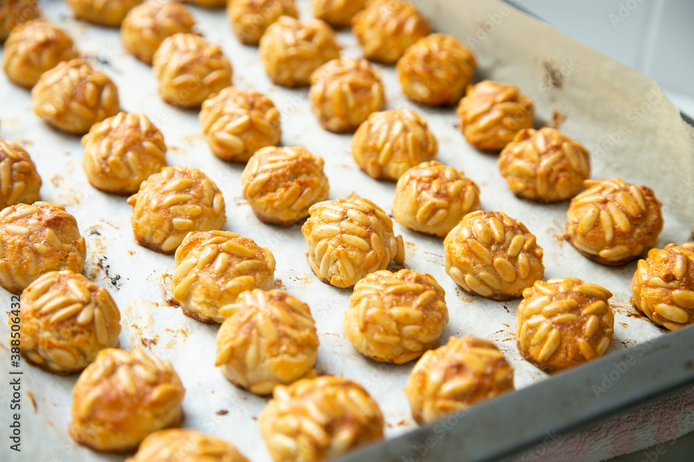 Almond and pine nuts Panellets . Traditional Catalan sweet made with potato, egg, sugar, almonds and pine nuts. Prepares to celebrate Halloween and November 1st