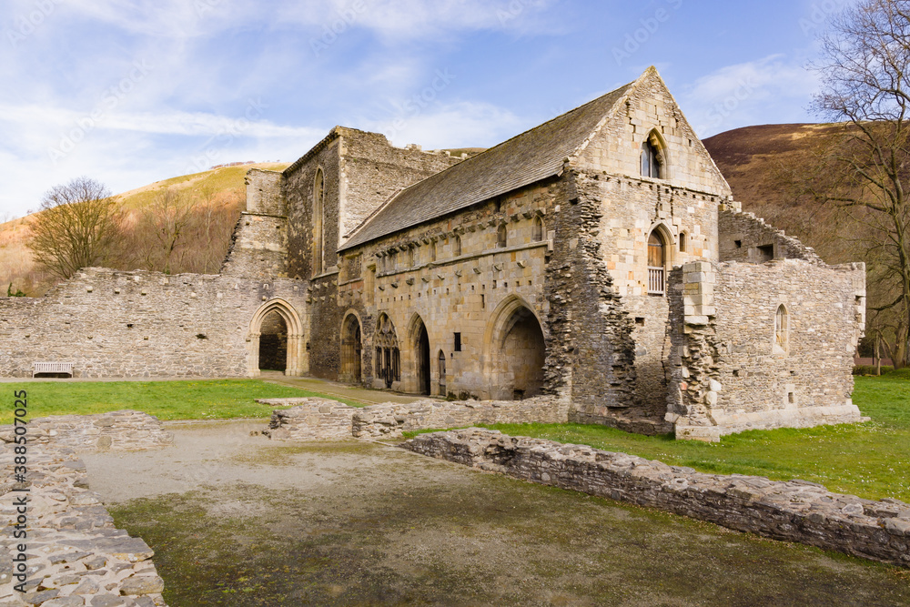 Valle Crucis Abbey was founded in 1201 as a Cistercian monastery and closed in 1537. The ruins are a prominent landmark in the vale of Llangollen, Wales, UK