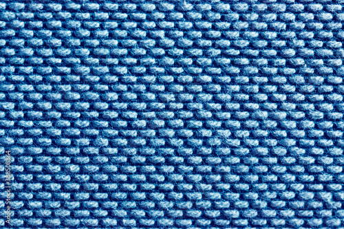 Blue abstract fabric texture background. Copyspace for text.