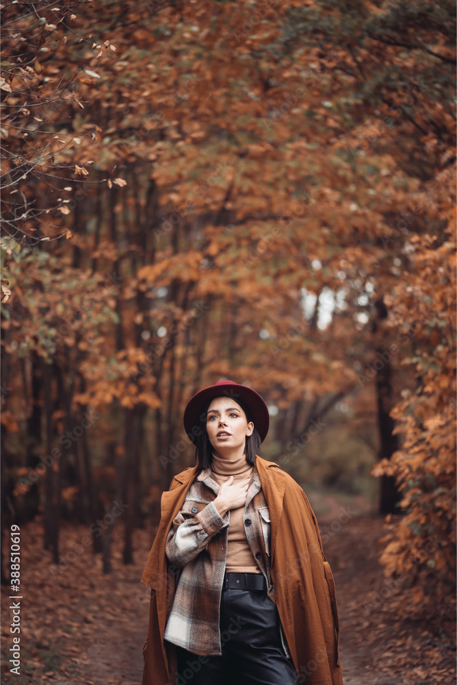 Beautiful woman enjoing autumn day. Beauty and fashion. Autumn fashion and lifestyle. Pretty woman wearing warm autumn clothes, hat and yellow scarf. Autumn mood. Fashionable woman outdoors. Beautiful woman enjoing autumn day. Beauty and fashion. Autumn fashion and lifestyle. Pretty woman wearing warm autumn clothes, hat and yellow scarf. Autumn mood. Fashionable woman outdoors.