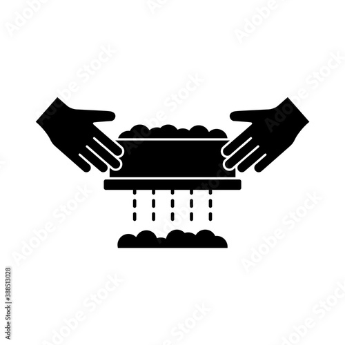 Manual handheld sifting. Silhouette icon of handmade cooking. Two hands hold sieve with flour, cereals or powdered sugar. Black simple illustration. Outline isolated vector pictogram, white background