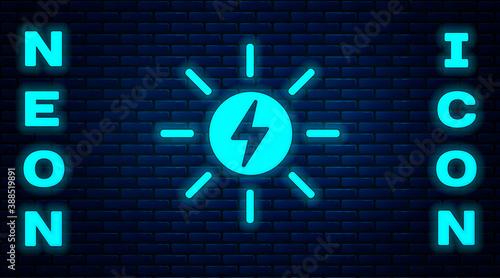 Glowing neon Solar energy panel icon isolated on brick wall background. Sun with lightning symbol. Vector.