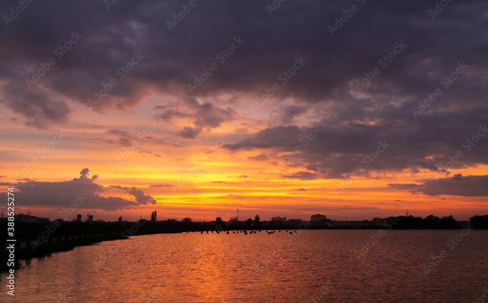 Naklejka premium colorful dramatic sky with cloud at sunset