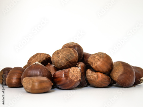 Close up of chesnuts on white background