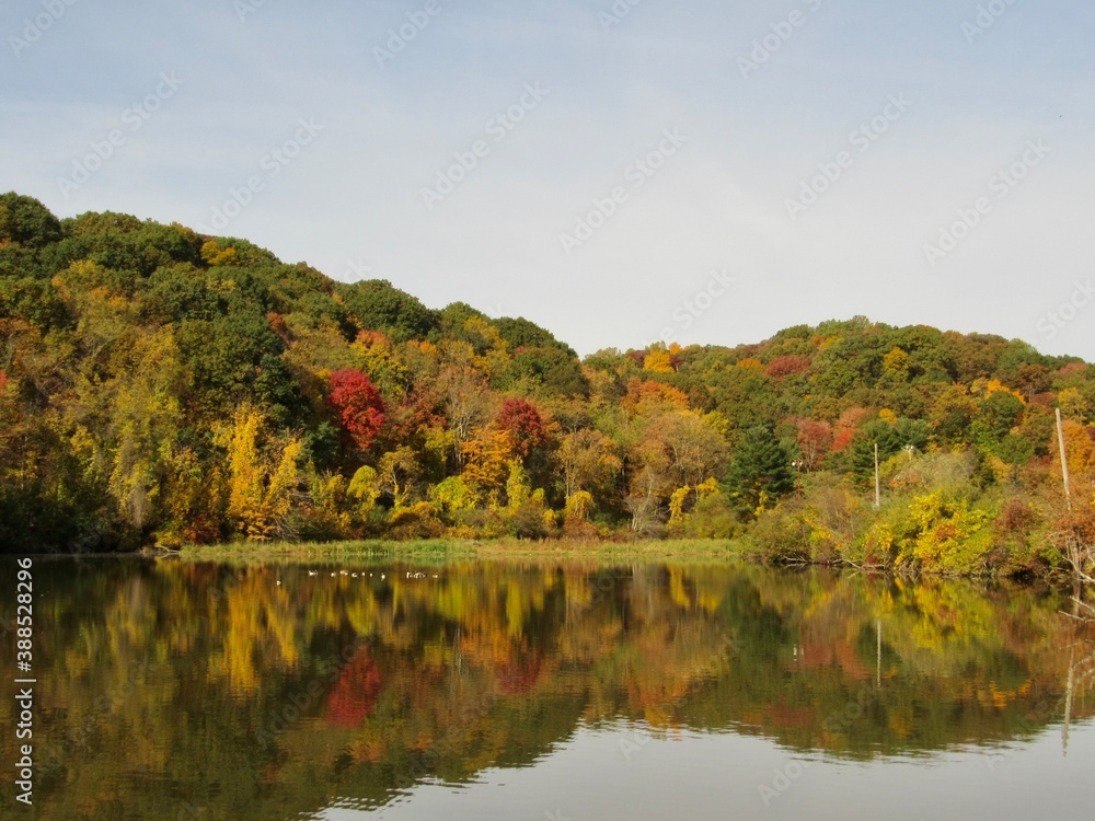 Fototapeta premium autumn landscape with lake