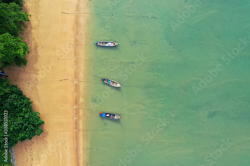 Aerial view of thai long tail boats On the beach at Railay beach, Krabi Province, Thailand © kathayut
