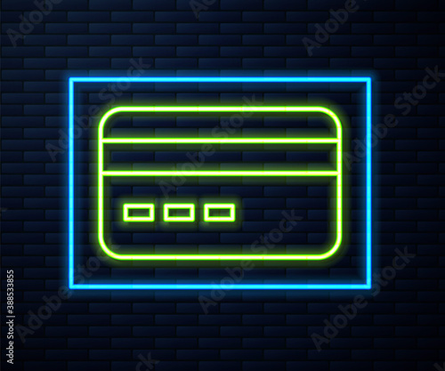 Glowing neon line Credit card icon isolated on brick wall background. Online payment. Cash withdrawal. Financial operations. Shopping sign. Vector.