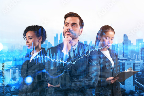 Photography Group of business colleagues in suits as a part of multinational corporate team working on forecasting trading corporate strategy at fund