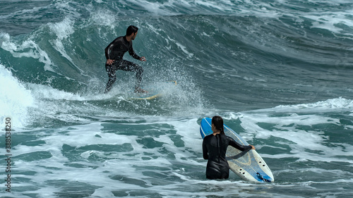 surfing on the beach of la cicer in Las Plamas de GRan Canaria
