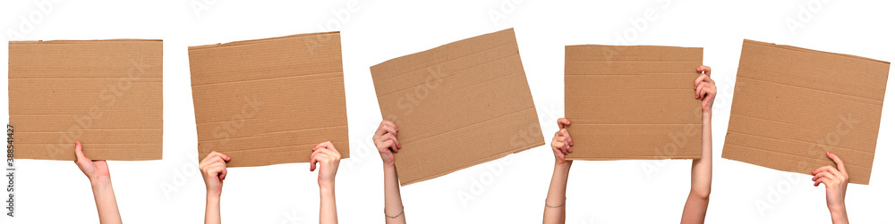 Posters of cardboard in his hands. Isolated on white. Set. Copy space. - obrazy, fototapety, plakaty 