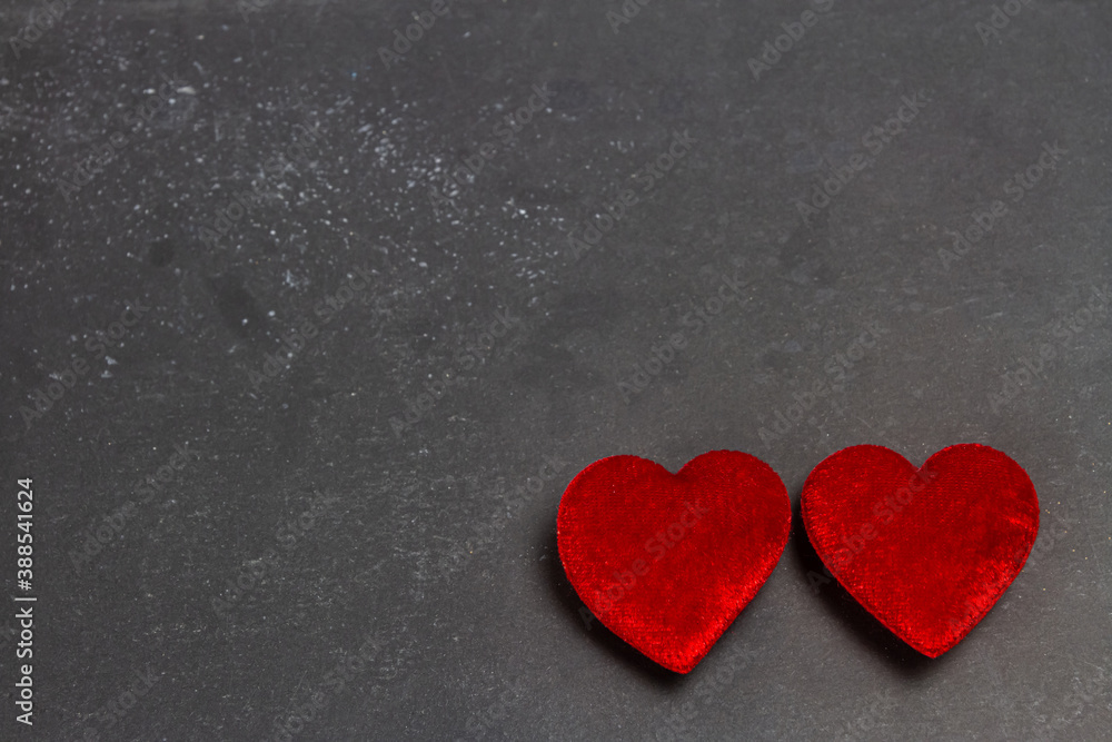 Duo red heart isolated on gray background. 