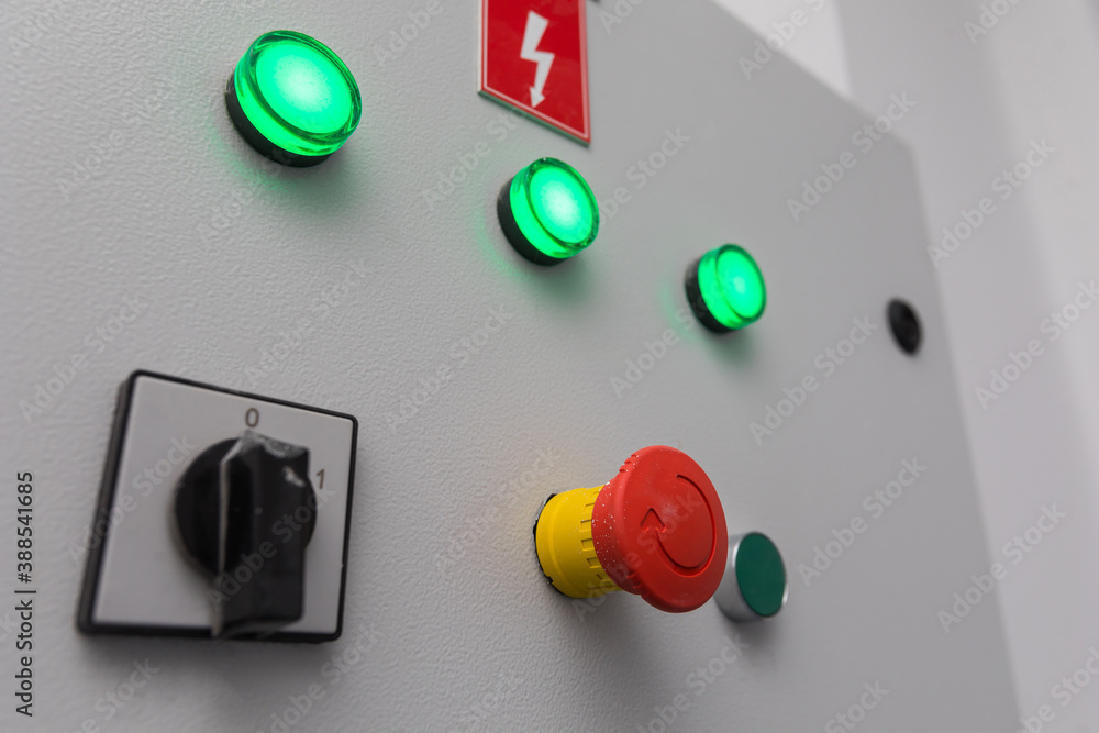 Emergency stop button and other electronic buttons in manufacturing facility Emergency stop button and other electronic buttons in manufacturing facility