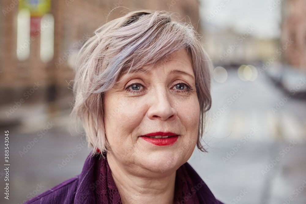 Portrait of mature pretty caucasian woman outdoors in Russia. Portrait of mature pretty caucasian woman outdoors in Russia.