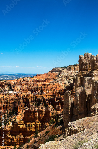 Bryce Canyon National Park is a national park in Utah Contained within the park is Bryce Canyon.Despite its name it is not a canyon,but is an amphitheatre created by erosion forming hoodoos columns