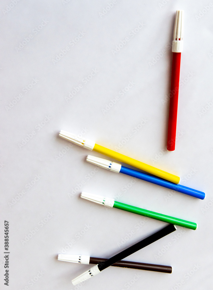 many different pens in different colours on a white background many different pens in different colours on a white background