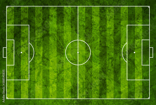 Top view of green grunge soccer field background. Sport graphic vector design