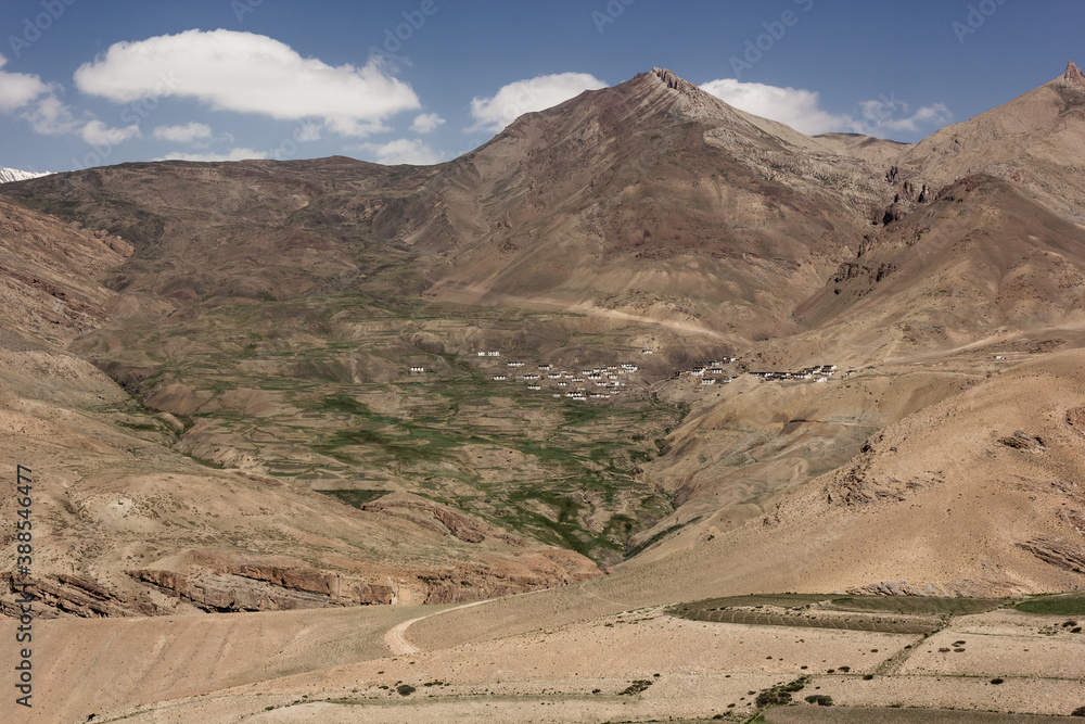 A village on the slopes of a high barren mountain in the Spiti valley
