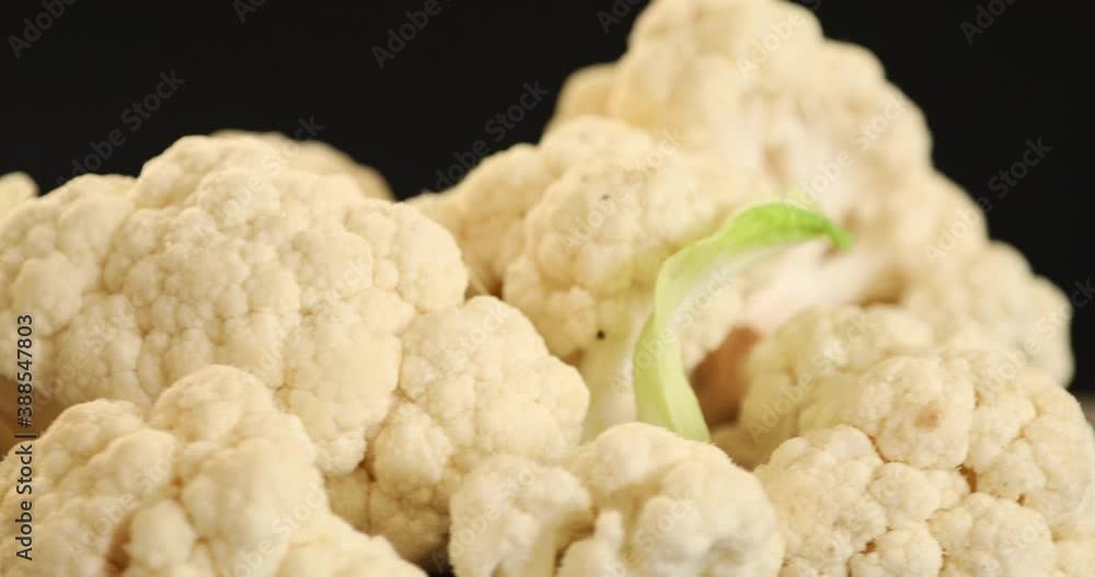 Close up shot of organic raw cauliflower cabbage rotating Close up shot of organic raw cauliflower cabbage rotating