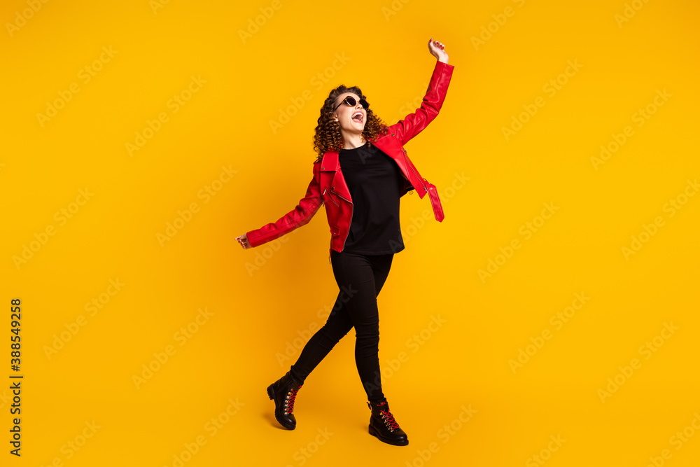 Full size photo of positive cheerful girl wear good look clothes boots isolated bright shine color background Full size photo of positive cheerful girl wear good look clothes boots isolated bright shine color background