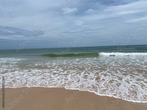 Waves breaking on the beach