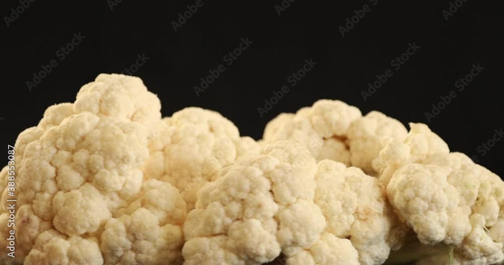 Close up shot of organic raw cauliflower cabbage rotating Close up shot of organic raw cauliflower cabbage rotating